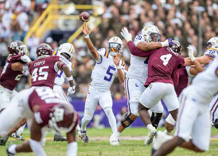 LSU Tigers quarterback Jayden Daniels throws a pass against the Texas A&M Aggies.